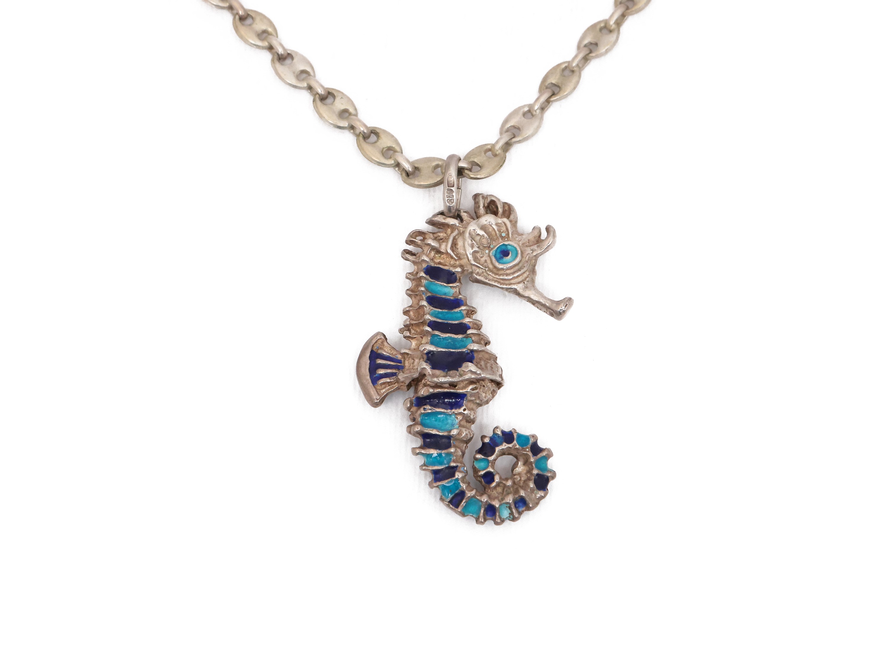 Lotto di bijoux in argento, composto da tre collane e un bracciale con smalti