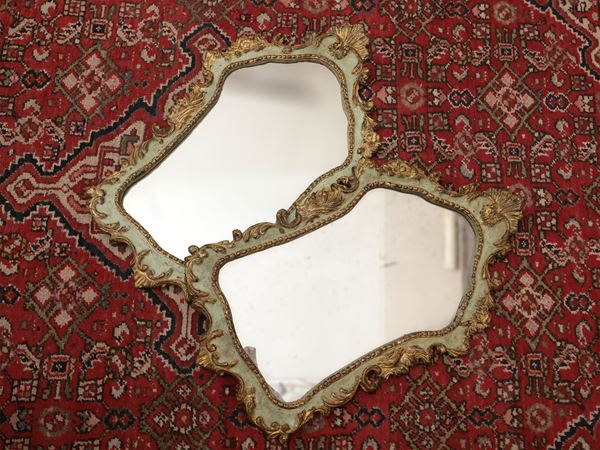 Coppia di specchiere in legno dorato e laccato
