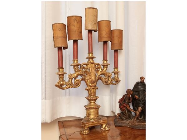 Candeliere in legno intagliato e dorato