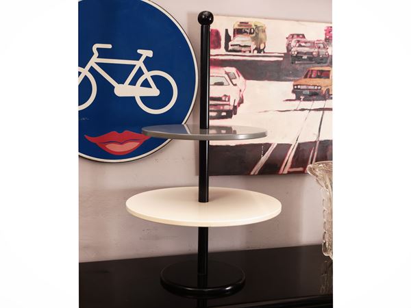 Room-raised with two circular shelves