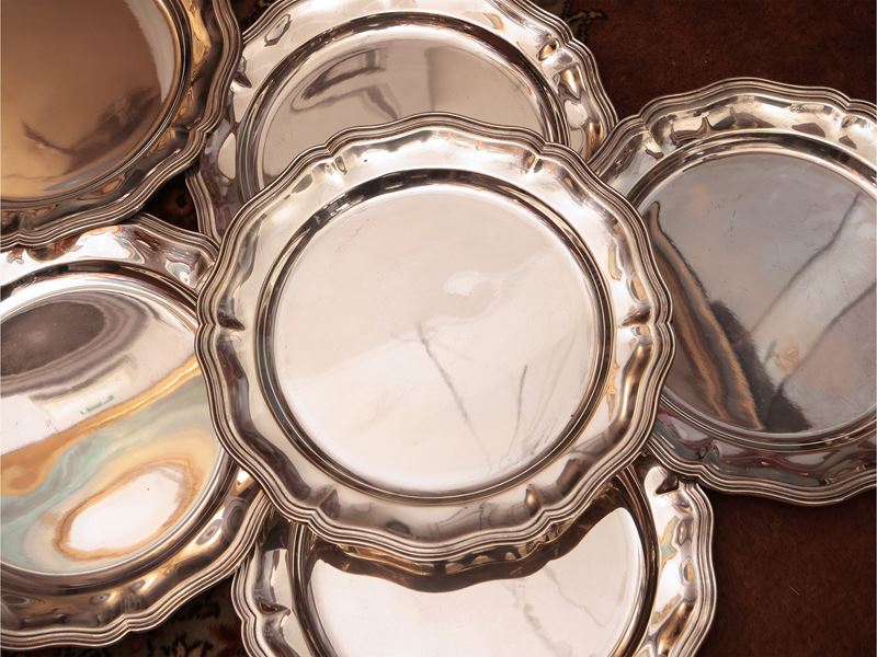 Serie di dodici sottopiatti in argento