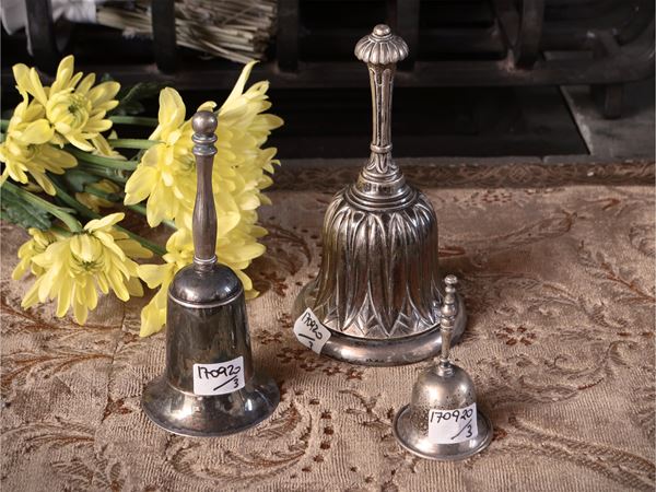 Three silver service bells