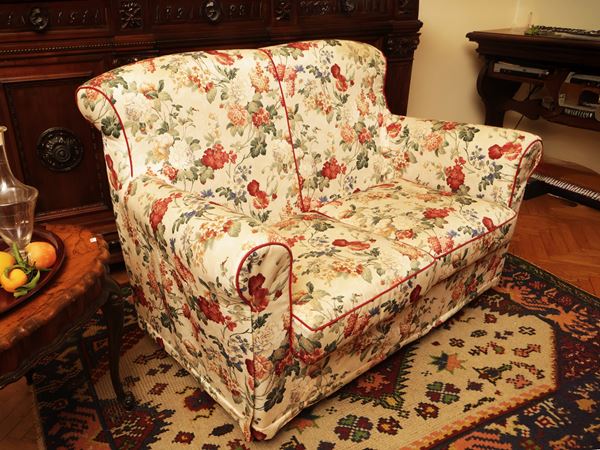 Two -seater padded sofa