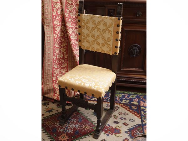 Series of eight ebanized wooden chairs