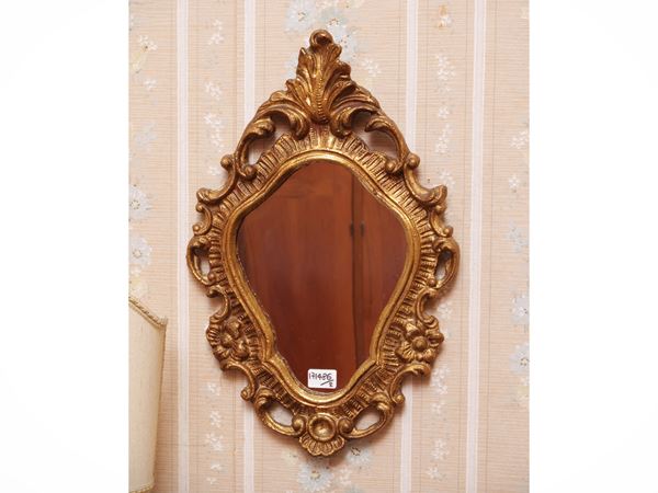 Pair of fans with carved and golden wooden frame
