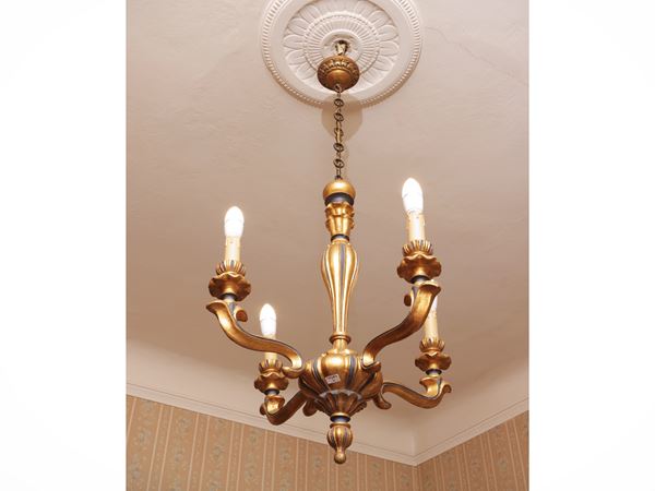 Carved and golden wood chandelier