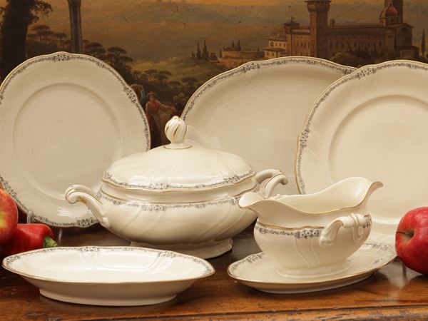 Service of dishes in German porcelain