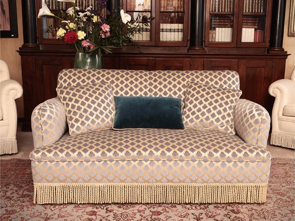 Two -seater padded sofa