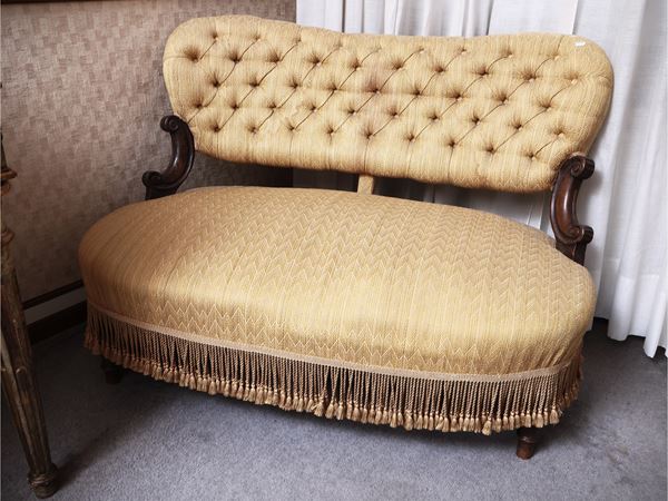 Padded walnut sofa