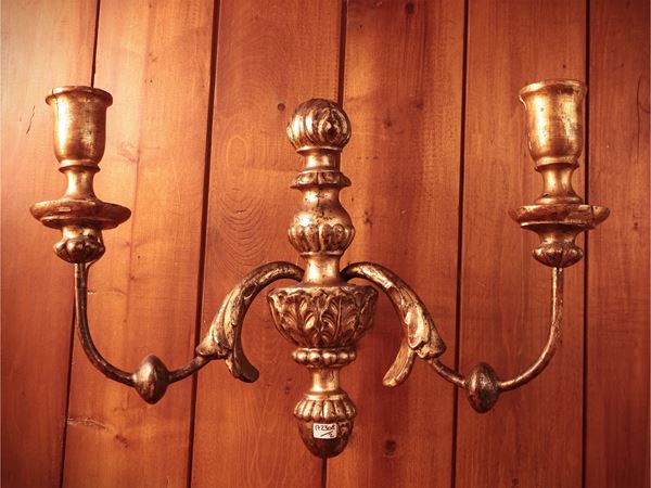 Pair of carved and golden wooden applique