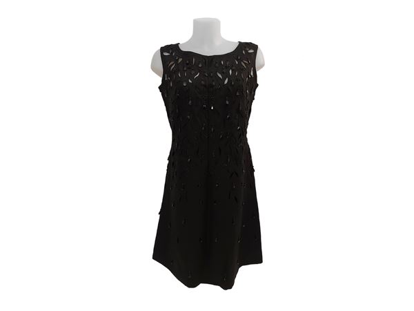Sartoral dress in black linen pierced with applied beads