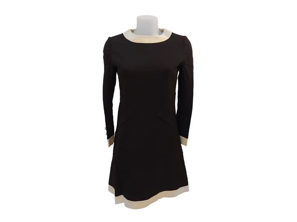 Tailored black silk dress with cream trim