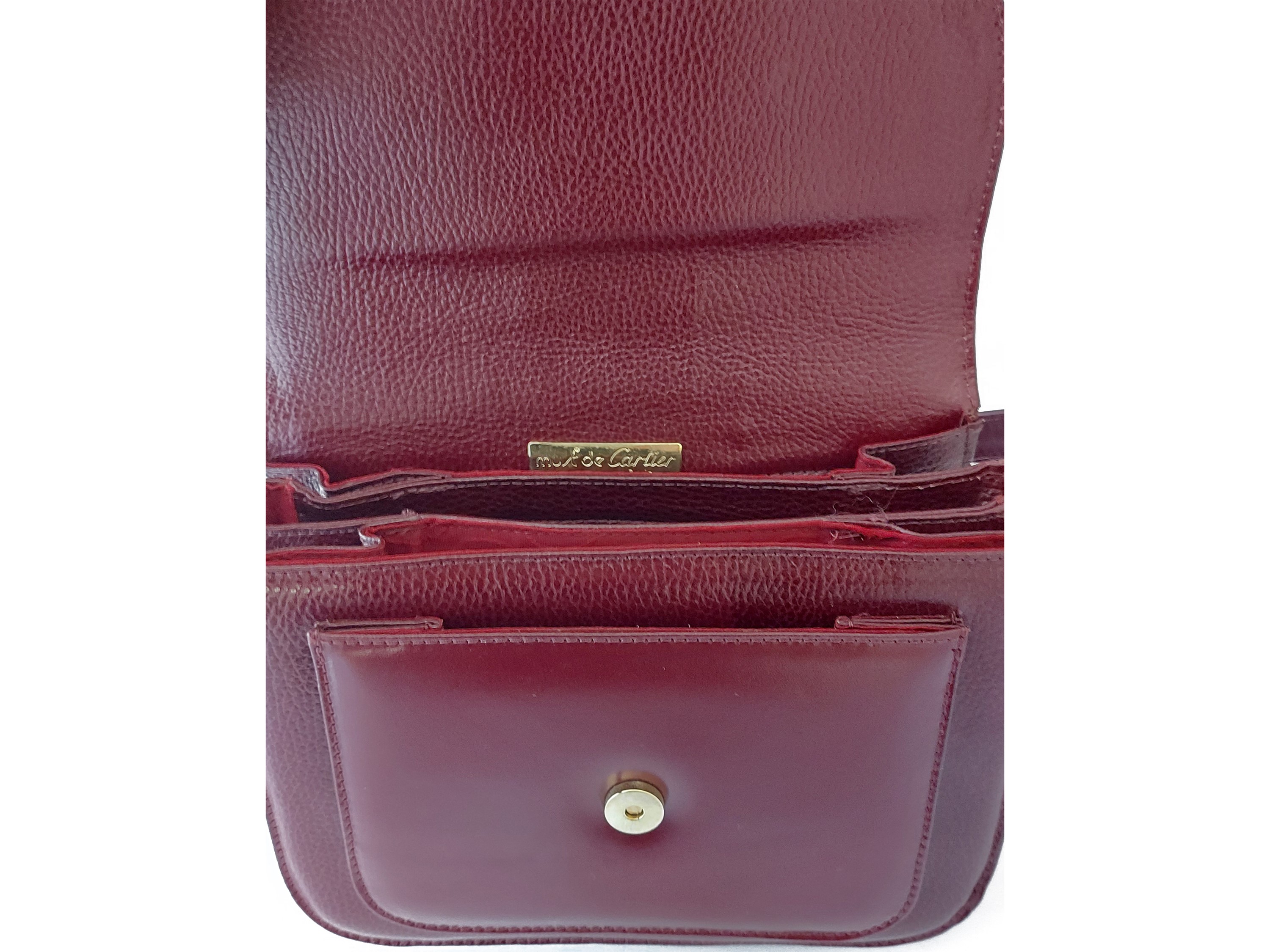 Must de Cartier - Borsa "Plain" a tracolla in vitello martellato bordeaux