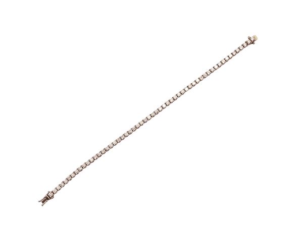 White gold tennis bracelet with diamonds