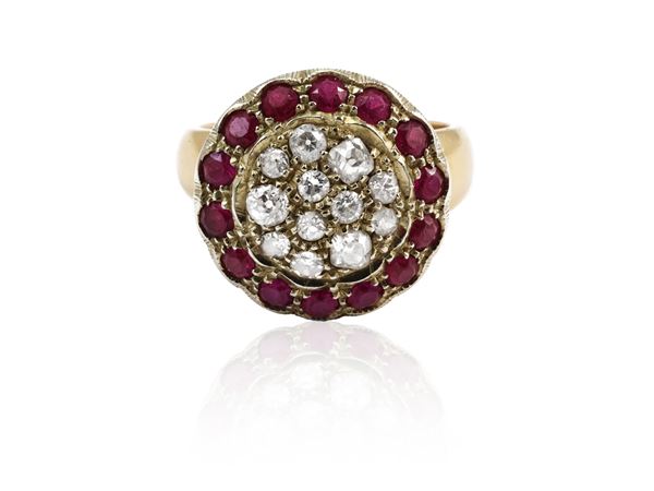 Yellow and white gold ring with diamonds and synthetic rubies