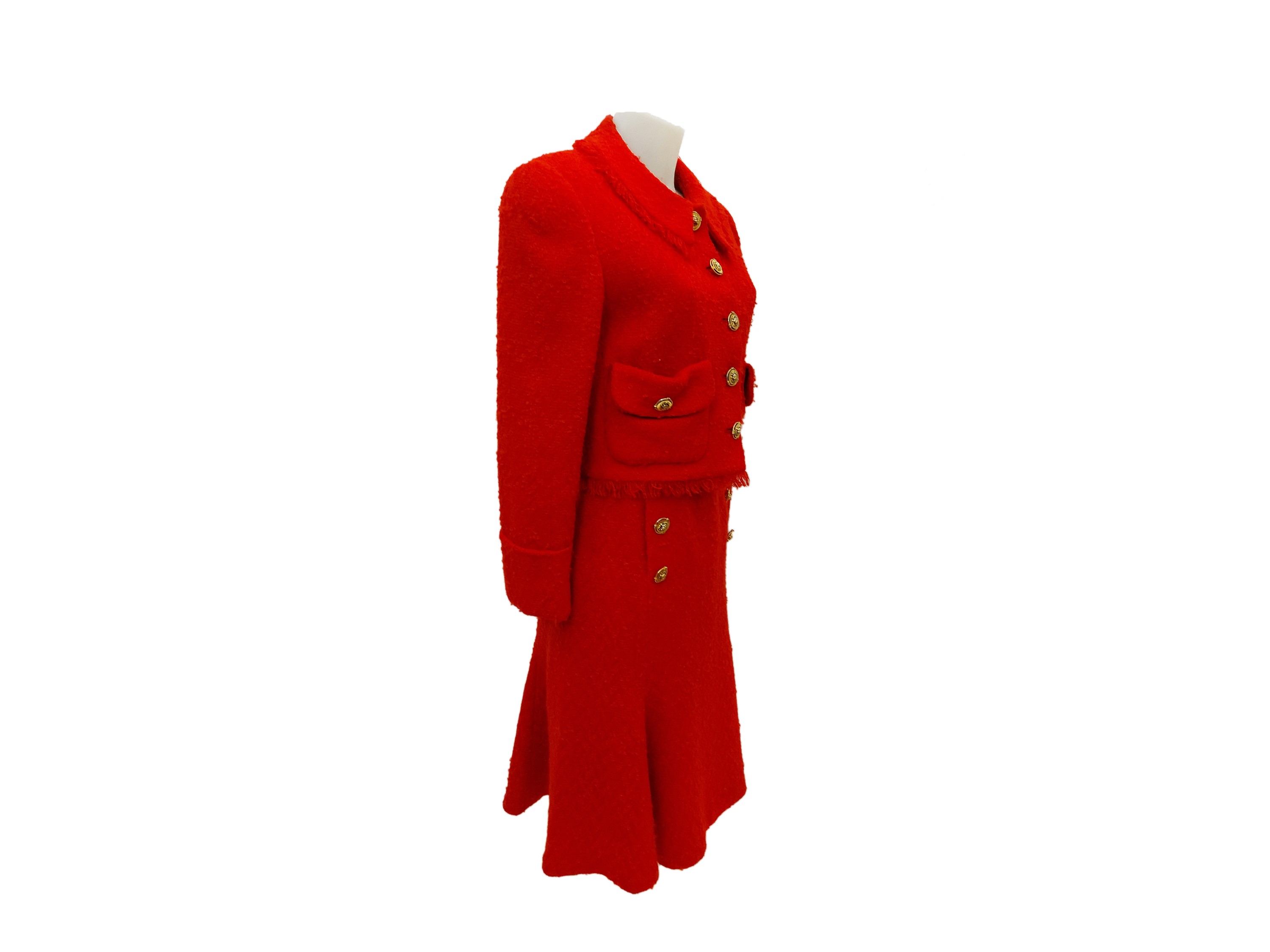 Tailleur sartoriale in lana bouclé rossa