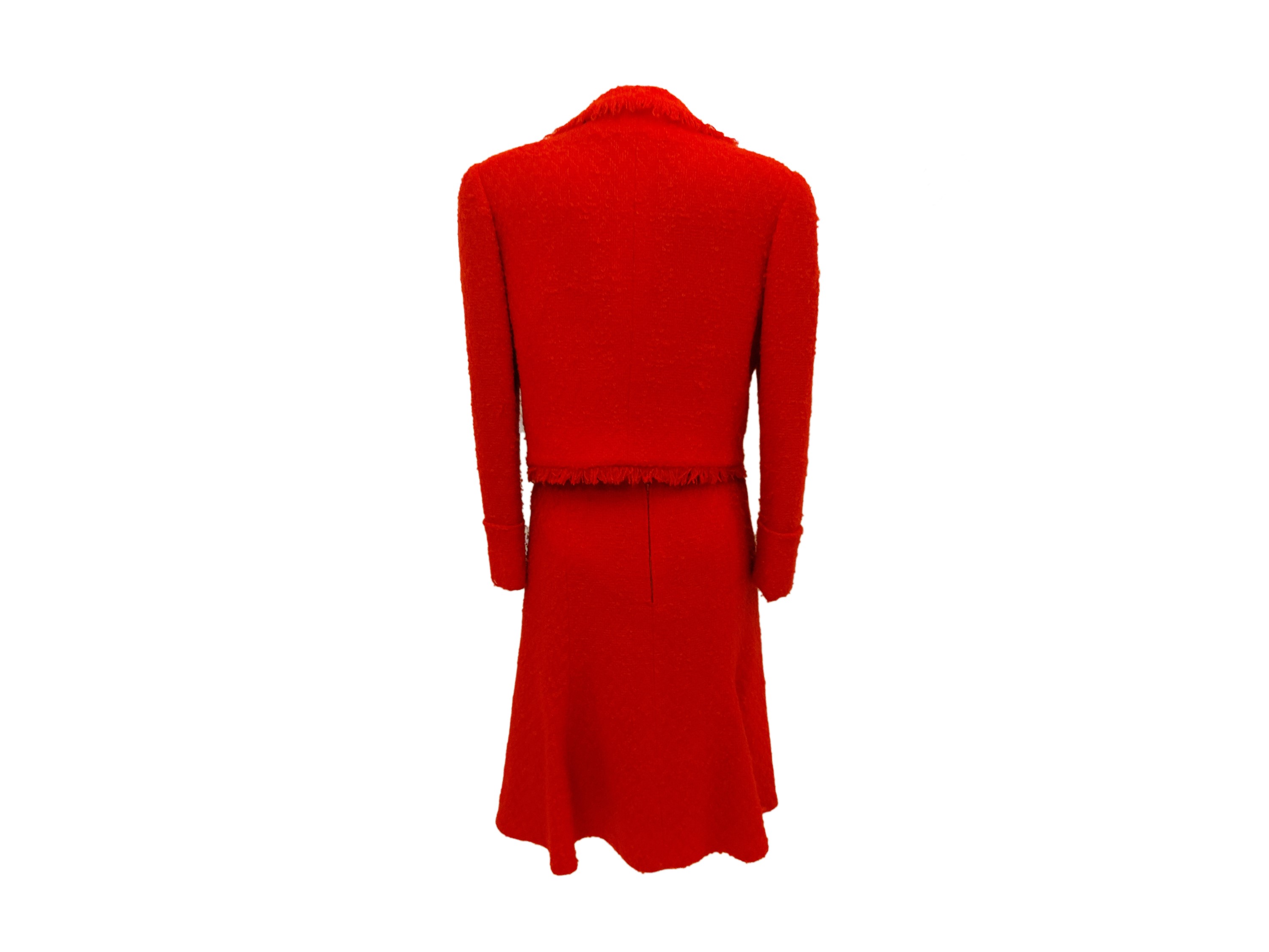 Tailleur sartoriale in lana bouclé rossa