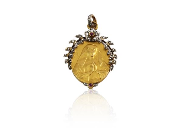 Votive pendant in yellow gold and silver with diamonds and rubies