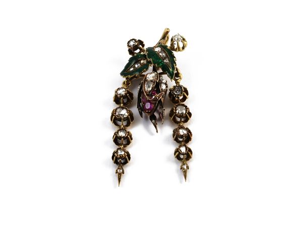 Yellow gold ad silver brooch/pendant with diamonds, rubies and enamels