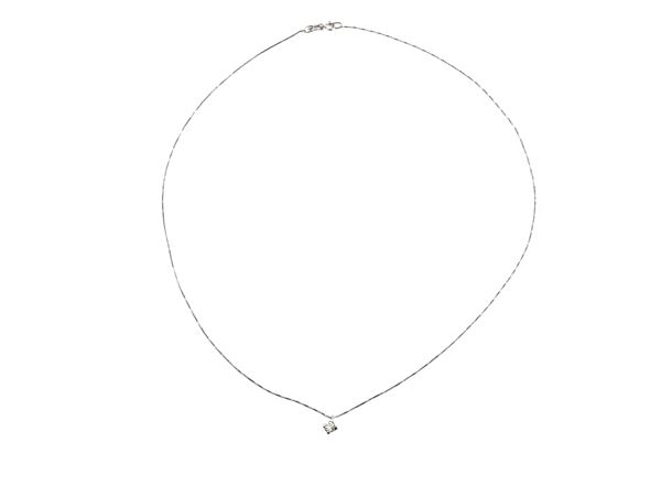 White gold solitaire necklace with diamond
