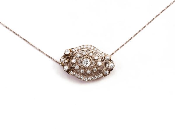 Yellow gold and platinum brooch with diamonds
