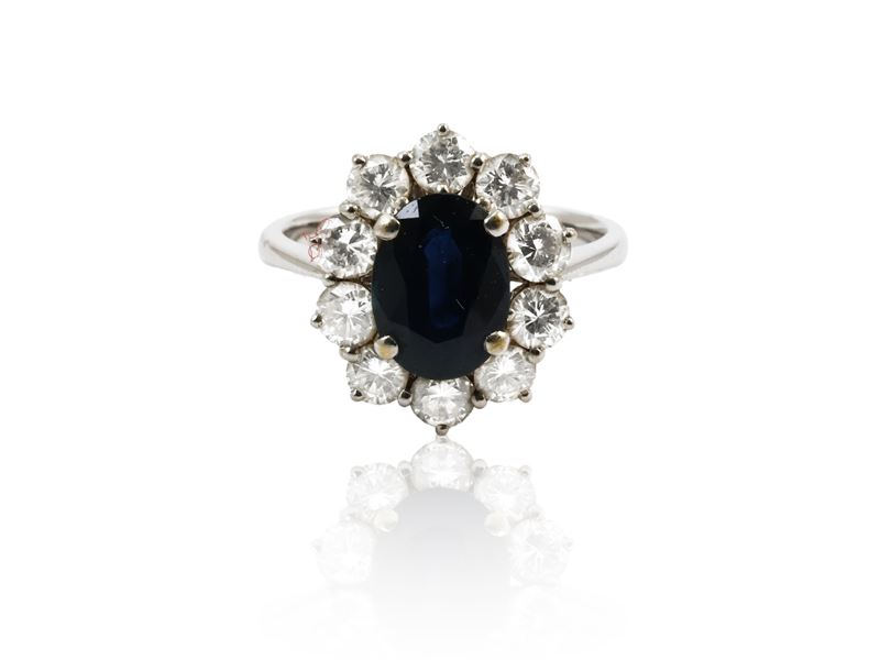 Anello in Oro Bianco con Zaffiro e Diamanti