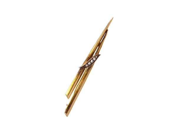 Yellow gold and silver barret brooch with diamonds