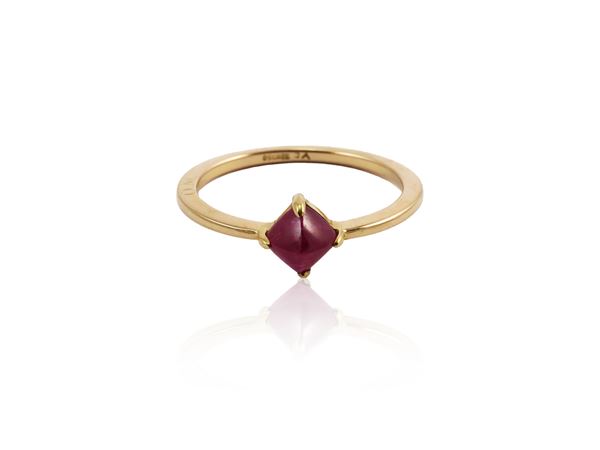 Yellow gold solitaire ring with glass filled ruby