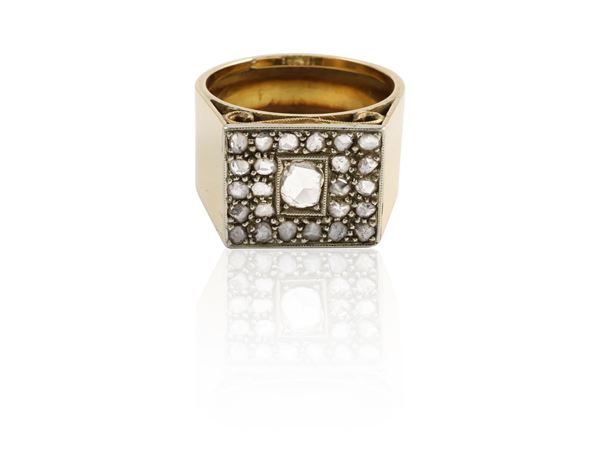 Geometric ring in yellow gold and silver with diamonds