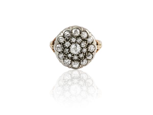 Yellow gold and silver ring with diamonds