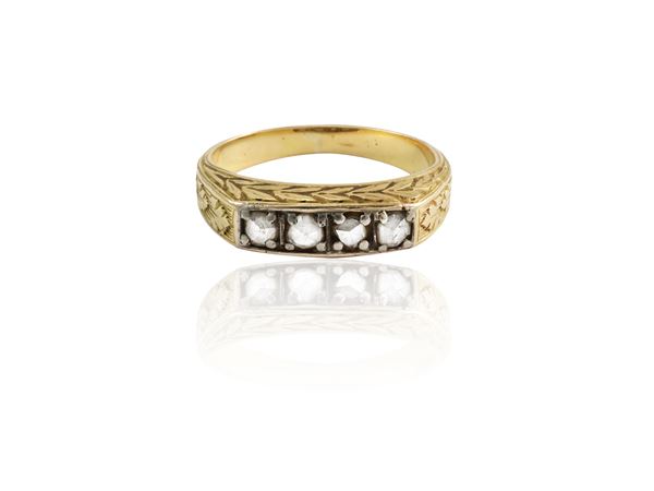 Yellow gold and silver riviere ring with diamonds