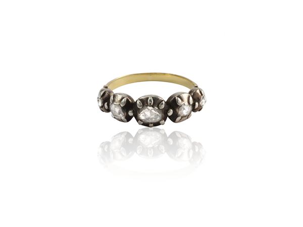 Ancient style yellow gold and silver riviere ring with diamonds