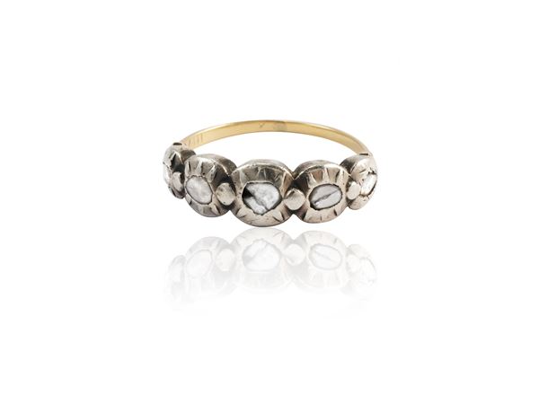 Ancient style riviere ring in low -titled yellow gold and silver with diamonds