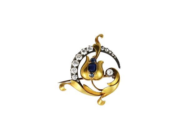 Liberty yellow gold and silver brooch with diamonds and sapphires