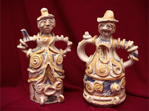 Pair of anthropomorphic liqueur bottles