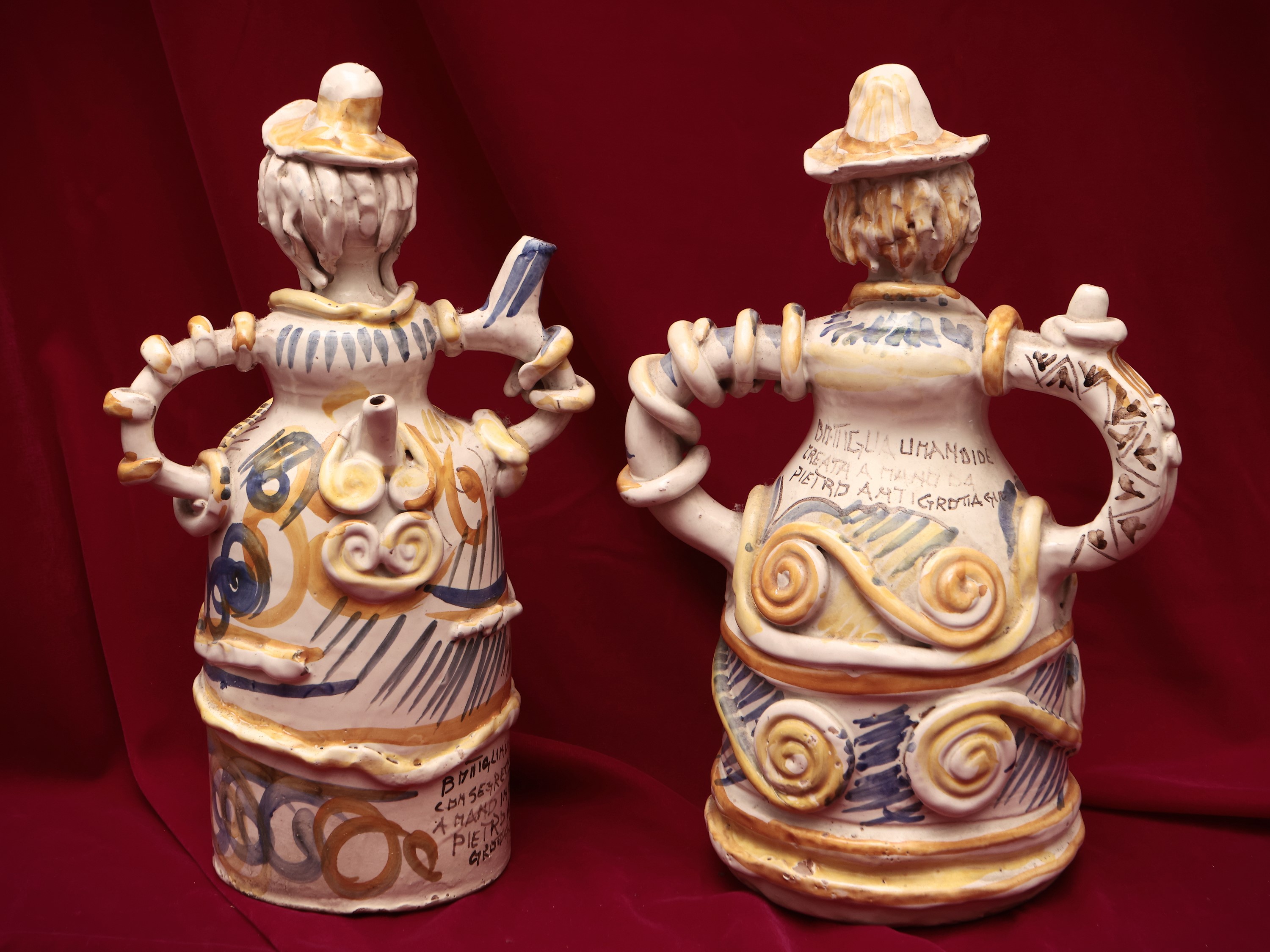 Coppia di Bottiglie da Liquore Antropomorfe