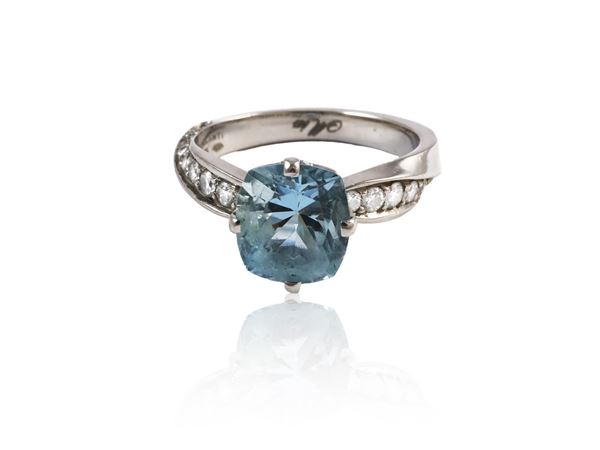 Platinum solitaire ring with aquamarine and diamonds