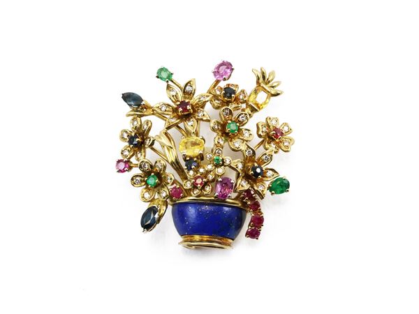 Yellow gold brooch with multicolor gems