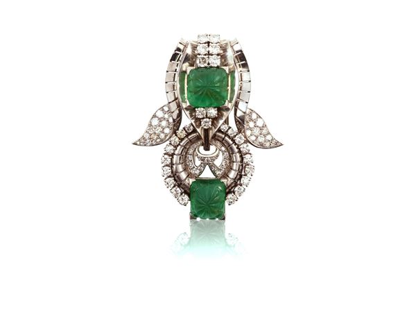 Platinum and gold brooch with emeralds and diamonds signed Boucheron Paris