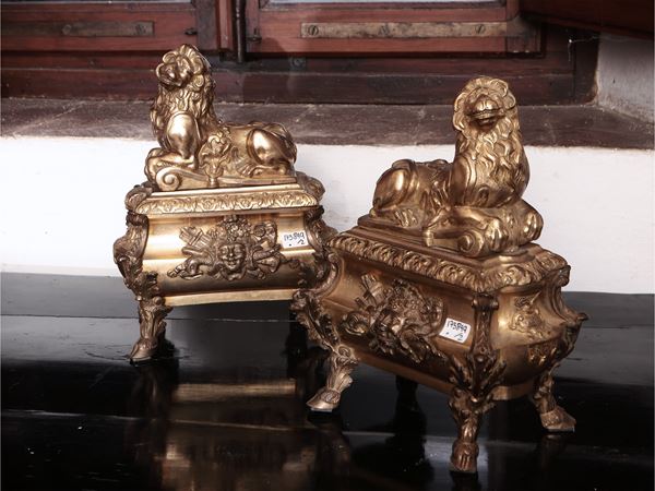 Coppia di basi per alari in bronzo dorato