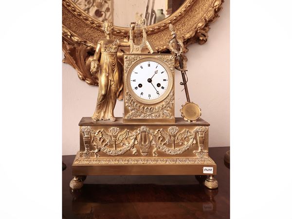 Orologio da tavolo in bronzo dorato