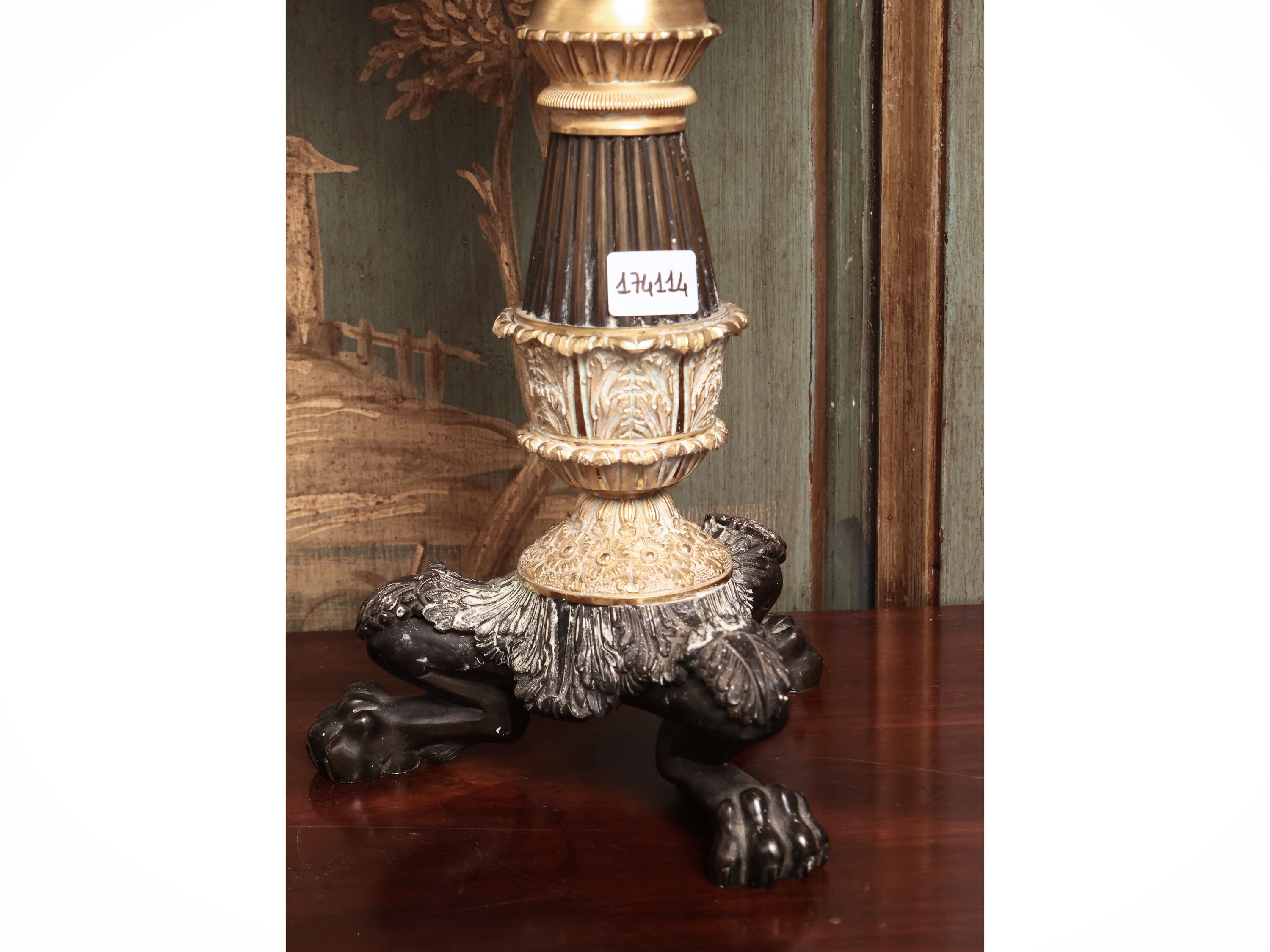 Orologio notturno in bronzo patinato e dorato