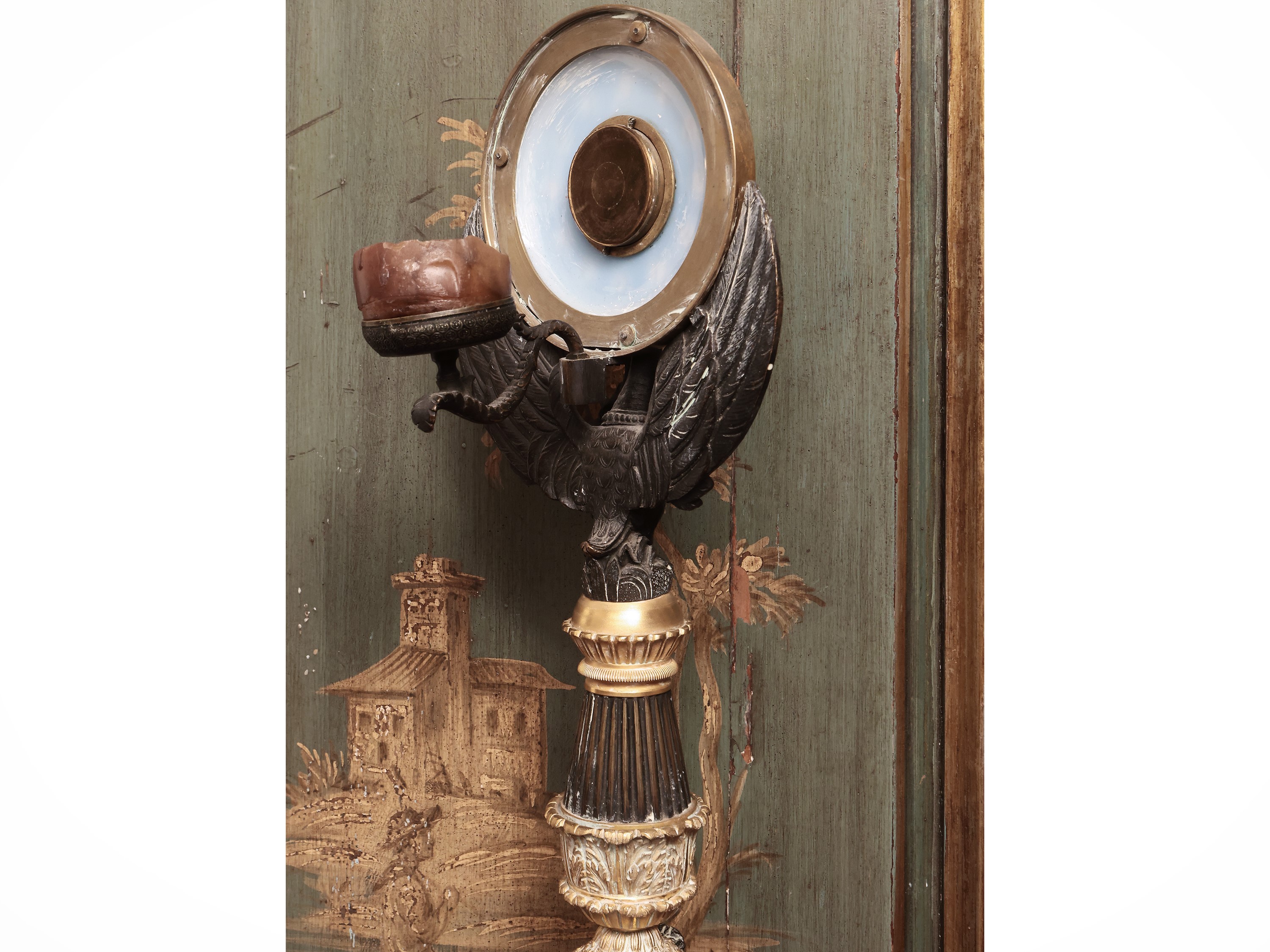 Orologio notturno in bronzo patinato e dorato