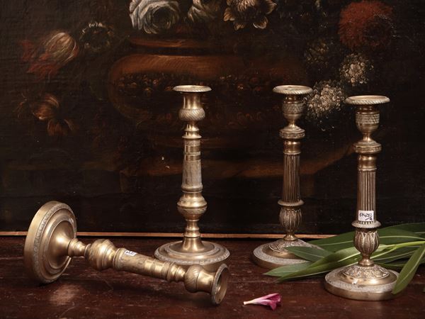 Due coppie di candelieri in ottone