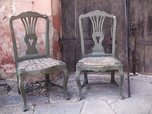 Serie di quattro sedie in legno laccato verde acqua