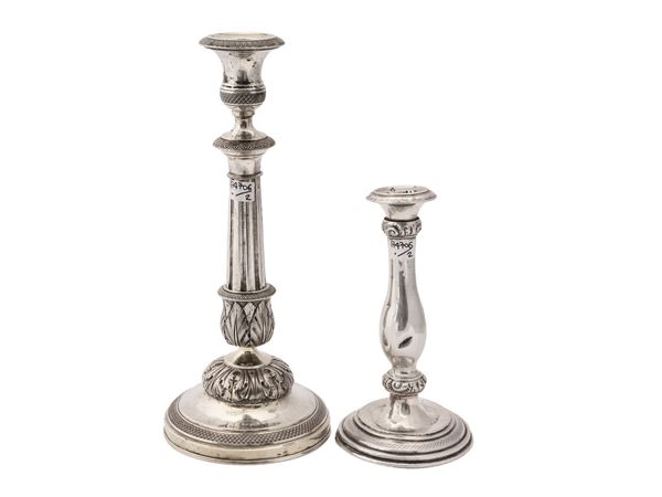 Check two vintage silver candlesticks