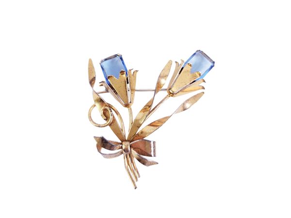 Spilla in argento sterling dorato con paste vitree color acquamarina