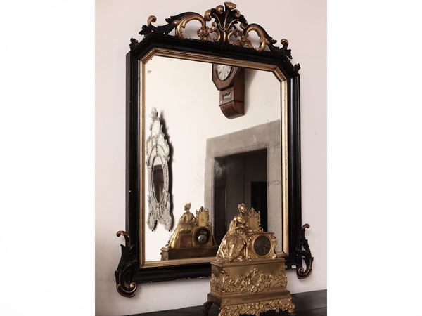 Specchiera con cornice in legno ebanizzato