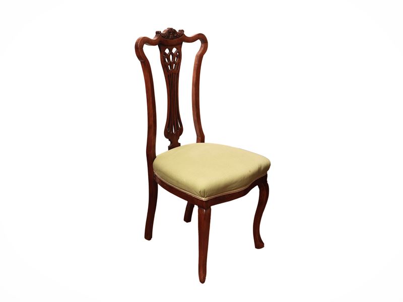 Serie di quattro sedie in noce di gusto Art Nouveau