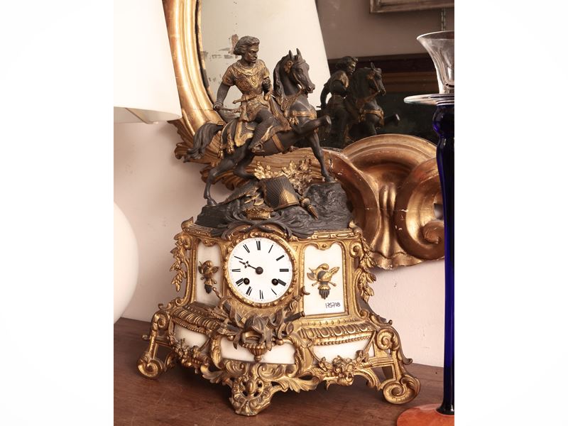 Orologio da tavolo in antimonio patinato e dorato